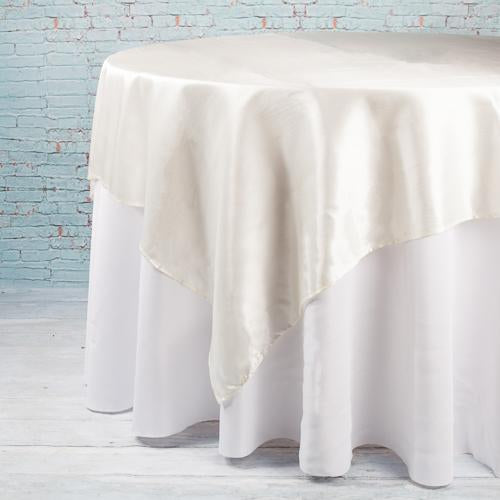 Richland 72"x72" Ivory Satin Table Overlay Set of 10
